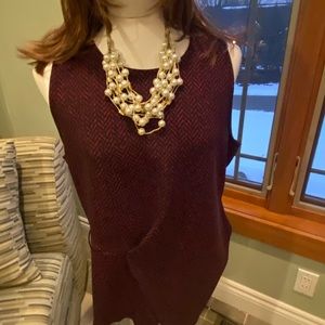 Cute Women’s vest. Pair with jeans or a black/maroon skirt.